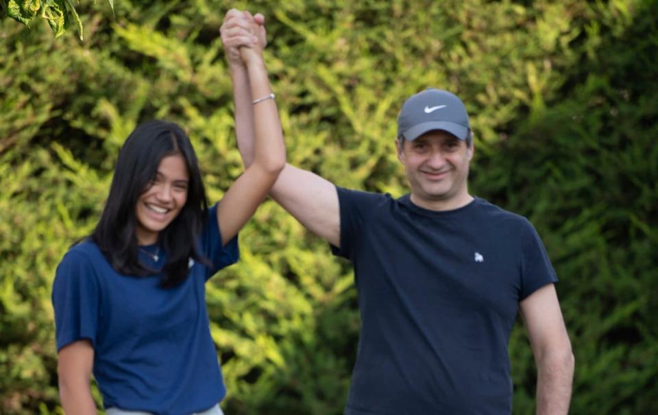 The winner returns Emma Raducanu is reunited with her father Ian as she arrive at her south London home - David Rose