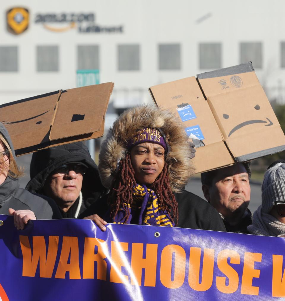 Tamara Clay, center, is one of the labor advocates protesting outside the Amazon Fulfillment warehouse in Robbinsville, New Jersey on December 18, 2018 to demand better protections for those working in Amazon warehouses.