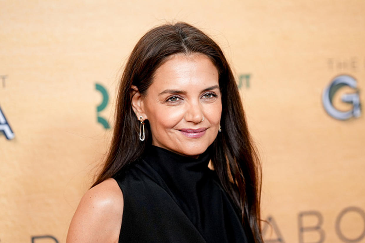 Katie Holmes in black dress on red carpet