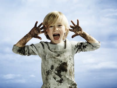 Child covered in dirt.