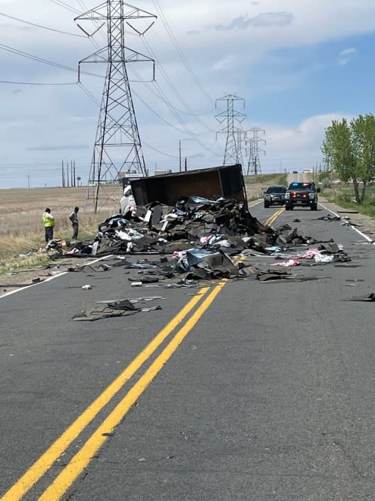 A rollover crash in Aurora closed the roadway due to spilled debris near East Colfax Avenue and Powhaton Road on May 20, 2024. (Aurora Police Department)