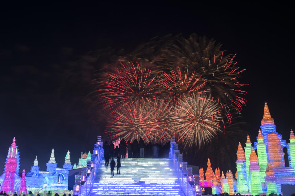 Tourists watch fireworks at the Ice and Snow World park on Jan. 5, 2019, in Harbin, China. The Ice and Snow World Park will host the 35th Harbin International Ice and Snow Sculpture Festival from Jan. 5 until the end of February. (Photo: Tao Zhang/Getty Images)