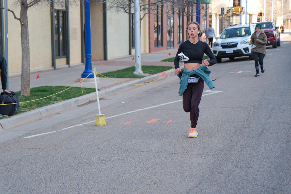 Alex Pinter, a 17-year-old Randall high schooler, approaches the finish line Saturday in the 2023 Center City Mural Run in downtown Amarillo.