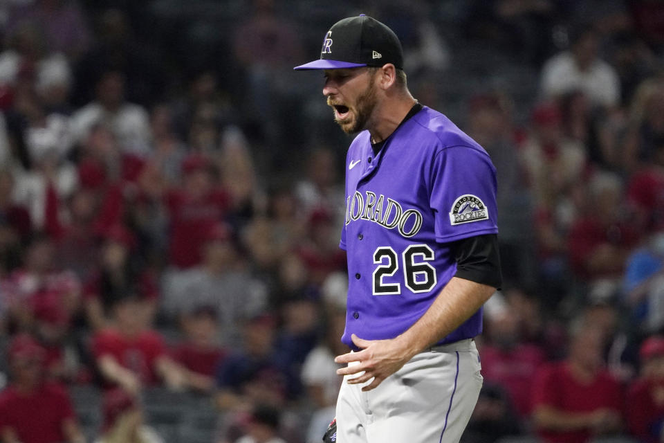 Colorado Rockies starting pitcher Austin Gomber yells as he walks back the dugout after giving up a two-run home run to Los Angeles Angels' Shohei Ohtani during the sixth inning of a baseball game Tuesday, July 27, 2021, in Anaheim, Calif. (AP Photo/Mark J. Terrill)