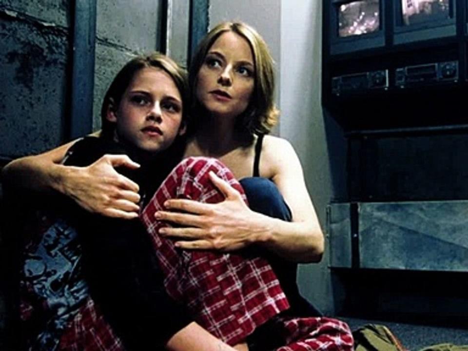 Jodie Foster holding Kristen Stewart