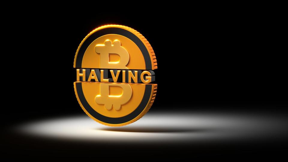 Artist's rendering of a gold coin with the Bitcoin symbol on it and the word halving cutting the coin in half.