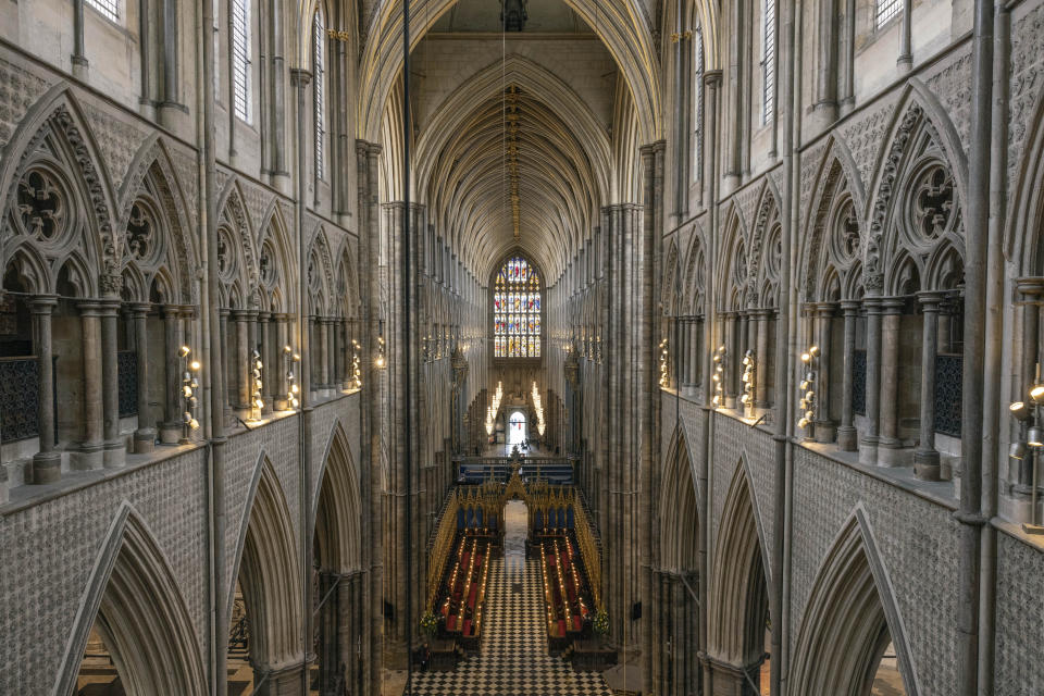 FILE - A general view inside Westminster Abbey in London, Wednesday, April 12, 2023, ahead of the King's coronation. The crowning of Charles and Camilla, the queen consort, will feature many of the elements of coronations past, the hymns, the prayers, the anointing with scented oils — all of which are designed to remind the world of the history, tradition and mystery embodied by the monarchy. (Dan Kitwood/Pool Photo via AP, File)