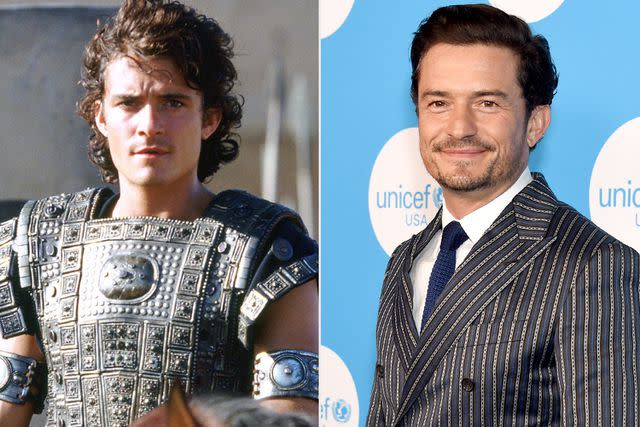 <p>Warner Bros.; Gregg DeGuire/FilmMagic</p> From L: Orlando Bloom in <em>Troy</em> (2004) and in 2021