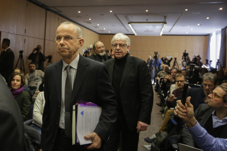 Guenter Lubitz, left, father of the Germanwings co-pilot of the plane crash in the Alps arrives with Hans-Joachim Ruedel, right, at a news conference, in Berlin, Germany, Friday, March 24 2017. Two years ago, the Germanwings machine 4U 9525 crashed in the Southern French Alps, killing 150 people. (AP Photo/Markus Schreiber)