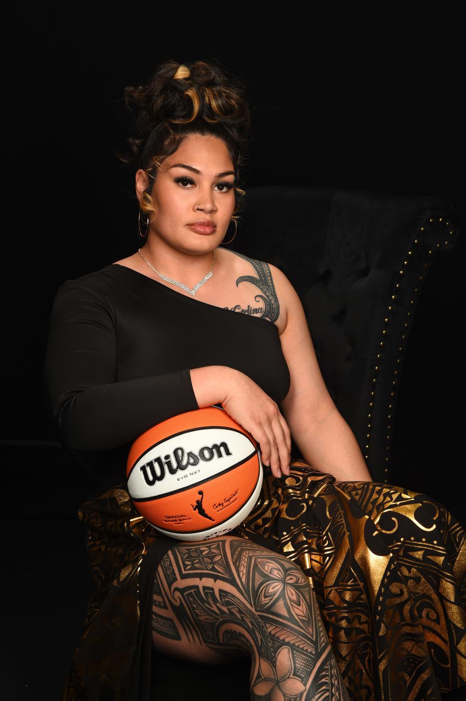 Alissa Pili's tattoos pay tribute to her heritage. She'll play for the Minnesota Lynx.