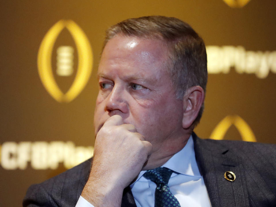 Notre Dame coach Brian Kelly listens during a news conference Thursday, Dec. 6, 2018, in Atlanta. Notre Dame is one of the four teams in the College Football Playoff. (AP Photo/John Bazemore)