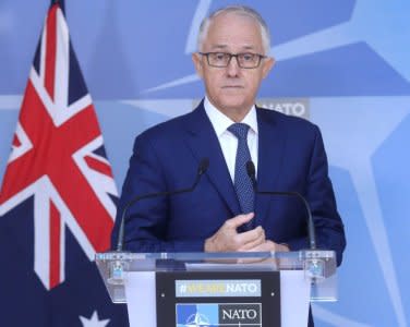 FILE PHOTO: Australian Prime Minister Malcolm Turnbull speaks at a news conference after a meeting with NATO Secretary-General Jens Stoltenberg at the Alliance's headquarters in Brussels, Belgium April 24, 2018.  REUTERS/Francois Walschaerts/File Photo