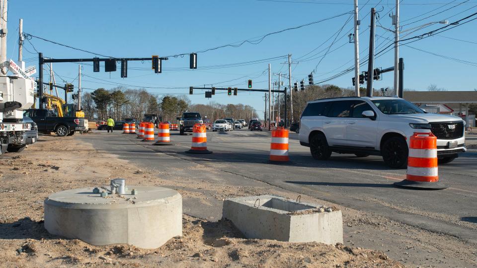 Morning traffic on Thursday navigates the intersection under reconstruction at Route 28 and Yarmouth Road in Hyannis. The project is an expensive intersection realignment primarily due to railroad tracks and utility relocations, a state project manager said in 2019.