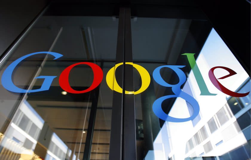 The Google logo is seen on the front door of the new Google Engineering center in Zurich, Switzerland. Google's stock surged by more than 6% after the company's earnings numbers came out.