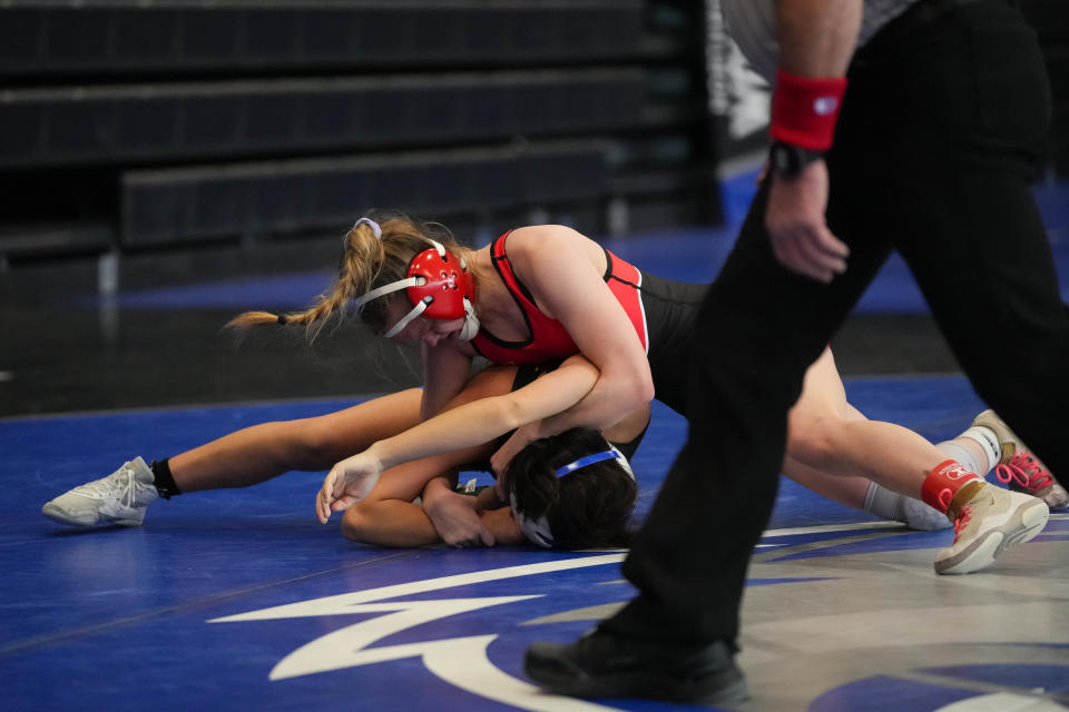 Cedar Falls' Hope Chiattello wrestles Humboldt's Catalina Elizondo in the second round of the Northwest Girls Invite at Waukee Northwest High School on Saturday, Jan. 14, 2023. Chiattello won and went on to win the 110-pound weight class.