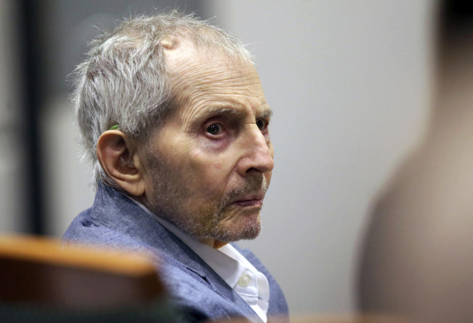 FILE - In this March 10, 2020, file photo, real estate heir Robert Durst looks over during his murder trial in Los Angeles. A judge on Monday, June 14, 2021, ordered that the murder trial of the multimillionaire real estate heir will continue, despite defense requests for a delay because he's in too much pain. Durst's lawyers argued that he was in such pain from a urinary tract infection and other undiagnosed issues that he couldn't even stand up to to dress for court. (AP Photo/Alex Gallardo, Pool, File)