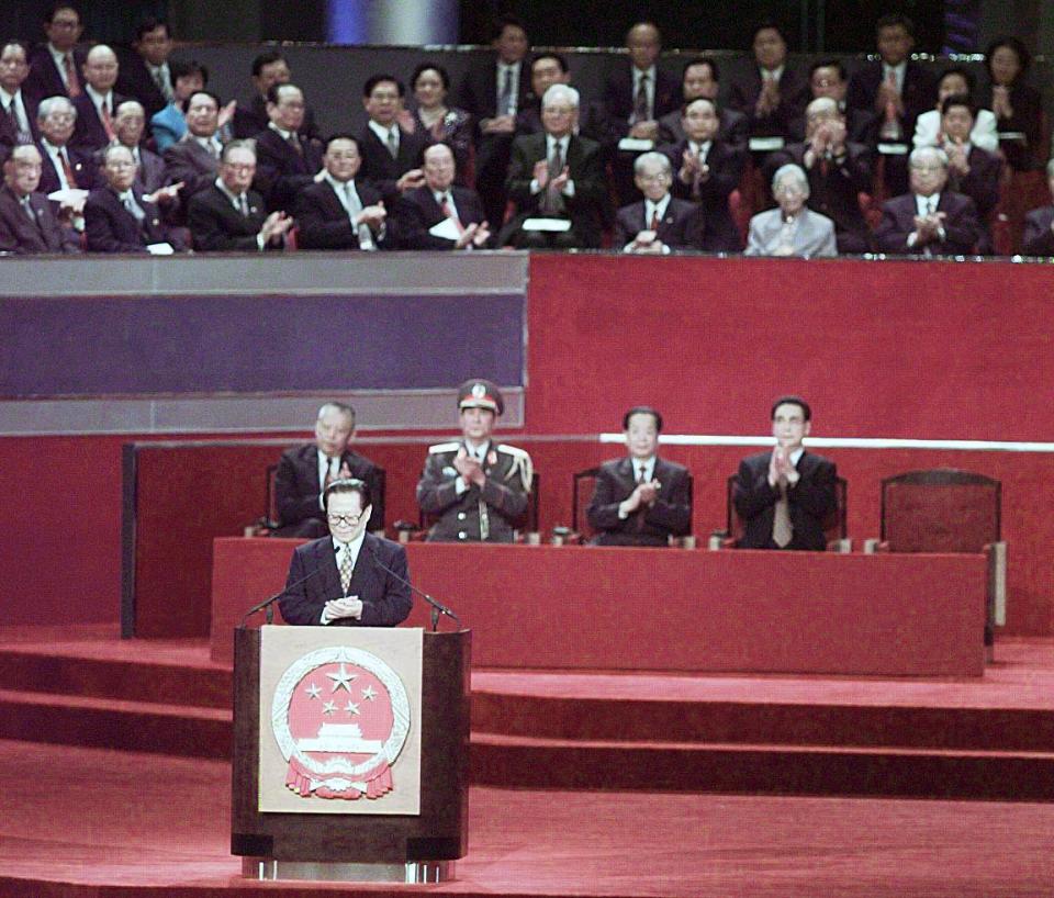 President Jiang Zemin makes his address following the raising of the national flag of China in Hong Kong early 01 July at the Handover of sovereignty ceremony.    (Electronic Image)  AFP PHOTO   Torsten Blackwood (Photo credit should read TORSTEN BLACKWOOD/AFP via Getty Images)