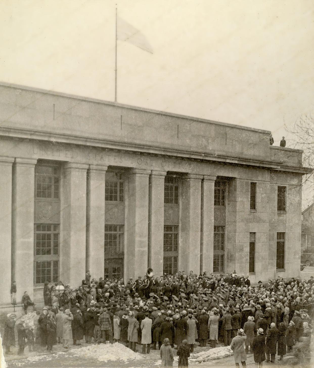 A crowd assembled on the steps of the Sheboygan Post office, Monday, January 8, 1934, for the dedication of the building which would not be completely finished until 1937 in Sheboygan, Wis.