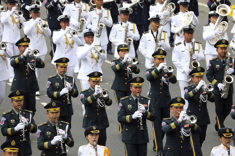 Military honour guards take part in the National Day celebrations in Taipei