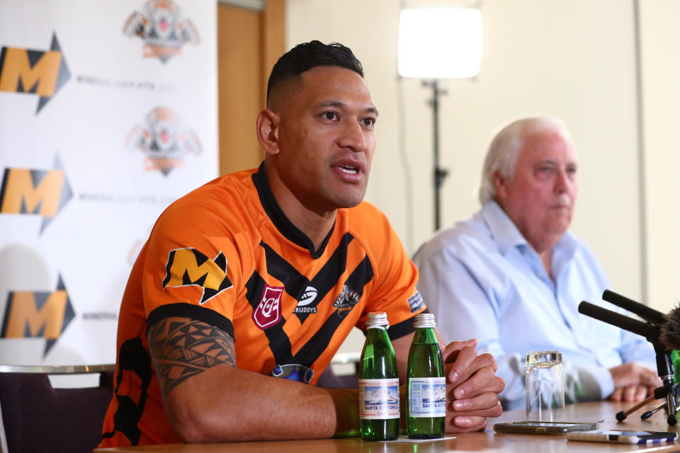 Israel Folau and Clive Palmer speak to the media during a press conference at the Hilton Hotel on May 21, 2021 in Brisbane, Australia.