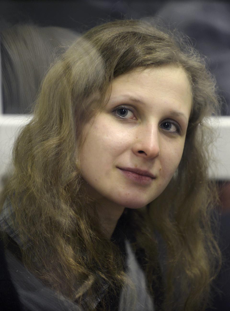 In this Wednesday, Jan. 16, 2013 file photo, jailed feminist punk band Pussy Riot member Maria Alekhina in a court room in the town of Berezniki, some 1500 km (940 miles) north-east of Moscow, Russia. (AP Photo/Alexander Agafonov, File)