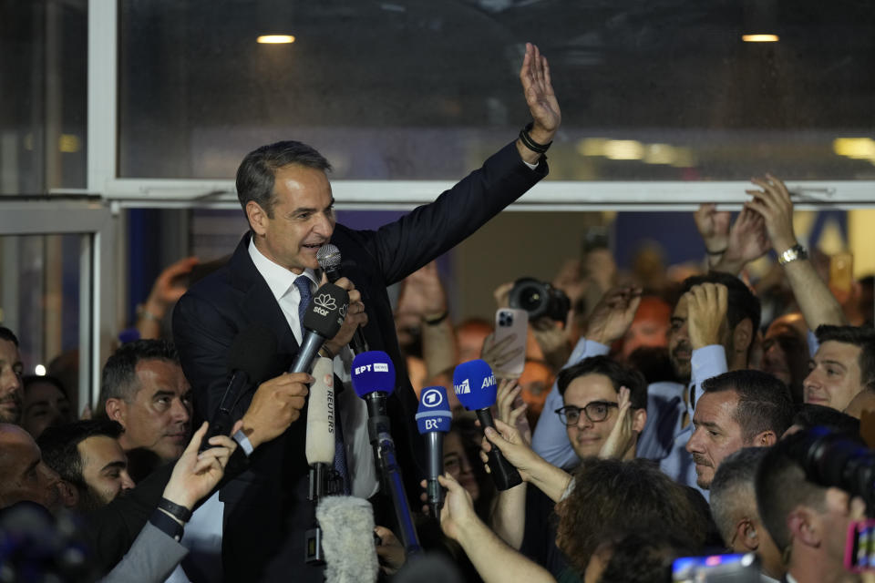 Greece's Prime Minister and leader of New Democracy Kyriakos Mitsotakis addresses supporters at the headquarters of his party in Athens, Greece, Sunday, May 21, 2023. The conservative party of Greek Prime Minister Kyriakos Mitsotakis has won a landslide election but without enough parliamentary seats to form a government. (AP Photo/Petros Giannakouris)