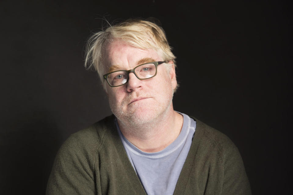 FILE - In this Jan. 19, 2014 file photo, Philip Seymour Hoffman poses for a portrait at The Collective and Gibson Lounge Powered by CEG, during the Sundance Film Festival, in Park City, Utah. A spokesperson for the New York City Medical Examiner announced on Friday, Feb. 28, that Hoffman’s death an accident. The Oscar-winning actor’s body was found on Feb. 2 with a needle still in his arm. Officials say he died from a toxic mix of heroin and other drugs. Attorney General Eric Holder on Wednesday called on first responders to use an overdose-reversal drug to help save lives amid a nationwide resurgence in heroin abuse, a public health scourge claiming the lives of celebrities and young people alike. (AP Photo/Victoria Will/Invision/AP)