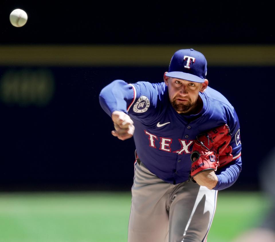 Texas Rangers pitcher Nathan Eovaldi (17) throws during the first inning against the Milwaukee Brewers on June 26 in Milwaukee.