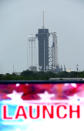 The SpaceX Falcon 9, with the Crew Dragon spacecraft on top of the rocket, sits on Launch Pad 39-A Monday, May 25, 2020, at Kennedy Space Center, Fla. Two astronauts will fly on the SpaceX Demo-2 mission to the International Space Station scheduled for launch on May 27. (AP Photo/David J. Phillip)