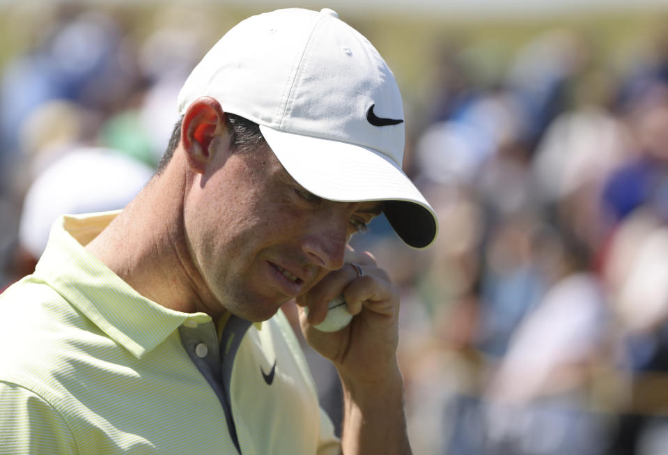 Northern Ireland's Rory McIlroy looks down as he walks from the 7th green uring the second round of the British Open Golf Championship at Royal St George's golf course Sandwich, England, Friday, July 16, 2021. (AP Photo/Ian Walton)