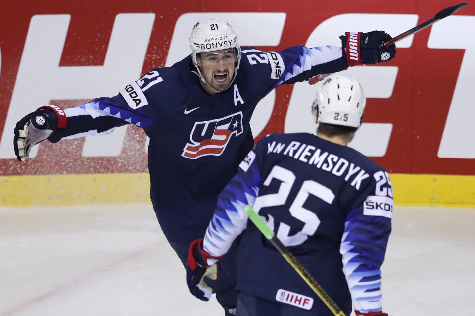 Dylan Larkin of the US, left, celebrates with James van Riemsdyk of the US, right, after scoring his sides second goal during the Ice Hockey World Championships group A match between Germany and the United States at the Steel Arena in Kosice, Slovakia, Sunday, May 19, 2019. (AP Photo/Petr David Josek)