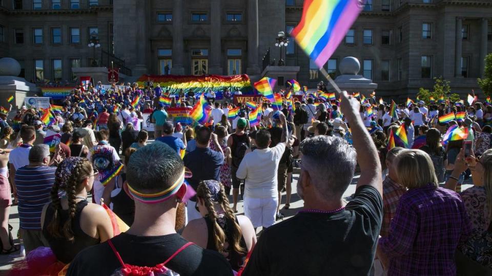 Hundreds of people gather at the Idaho Statehouse steps to rally for LGBTQ+ human rights Saturday, June 15, 2019 during Boise Pride Fest in Downtown Boise.