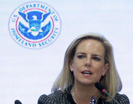 FILE PHOTO: U.S. Secretary of Homeland Security Kirstjen Nielsen speaks beside Honduras' President Juan Orlando Hernandez (not pictured) during a multilateral meeting at the Honduran Ministry of Security in Tegucigalpa, Honduras, March 27, 2019. REUTERS/Jorge Cabrera/File Photo