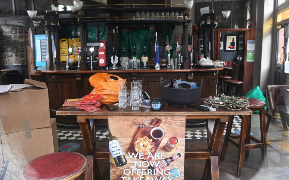 A pub in London offering takeaway pints - Facundo Arrizabalaga/EPA-EFE/Shutterstock