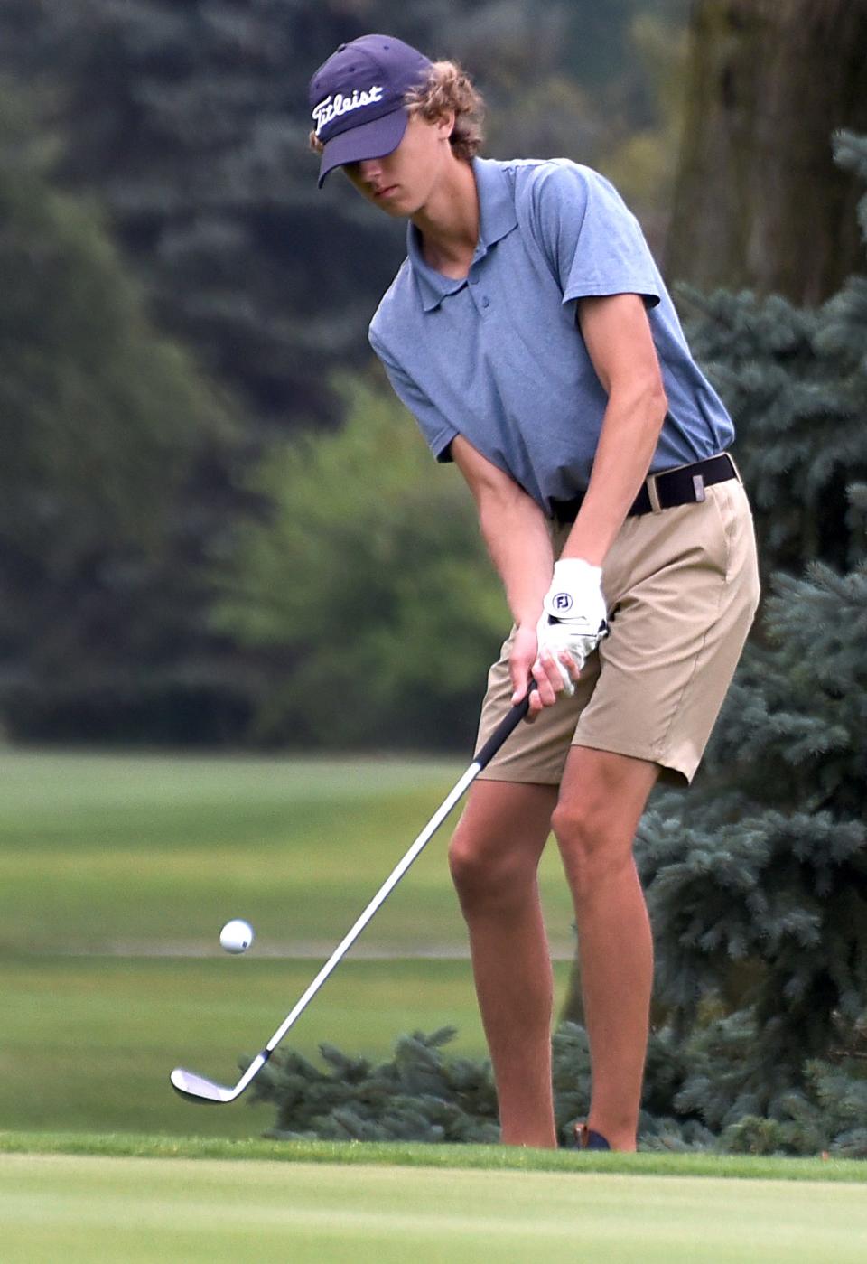 Aldo Barba of Tecumseh chips onto the green during the 44th annual La-Z-Boy Junior Open on Wednesday at Green Meadows.