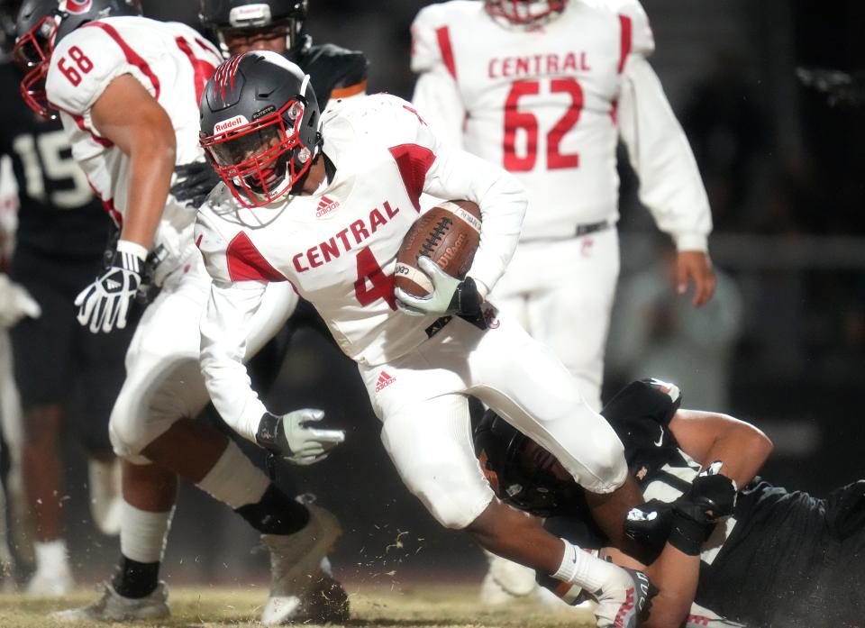 Central's Bryson Ballard (4) runs the ball against Desert Edge during their 5A playoff game in Goodyear on Friday, Nov. 18, 2022. 