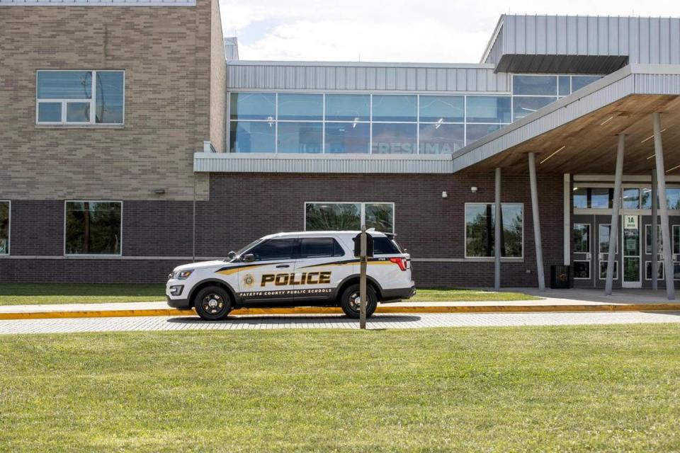 A Fayette County Public Schools police vehicle is parked in front of Frederick Douglass High School in Lexington, Ky., on Thursday, Sept. 22, 2022.