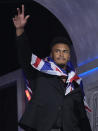 Travis Clayton reacts after being picked by the Buffalo Bills with the 221st overall pick in the seventh round during the third day of the NFL football draft, Saturday, April 27, 2024, in Detroit. (AP Photo/Jeff Roberson)