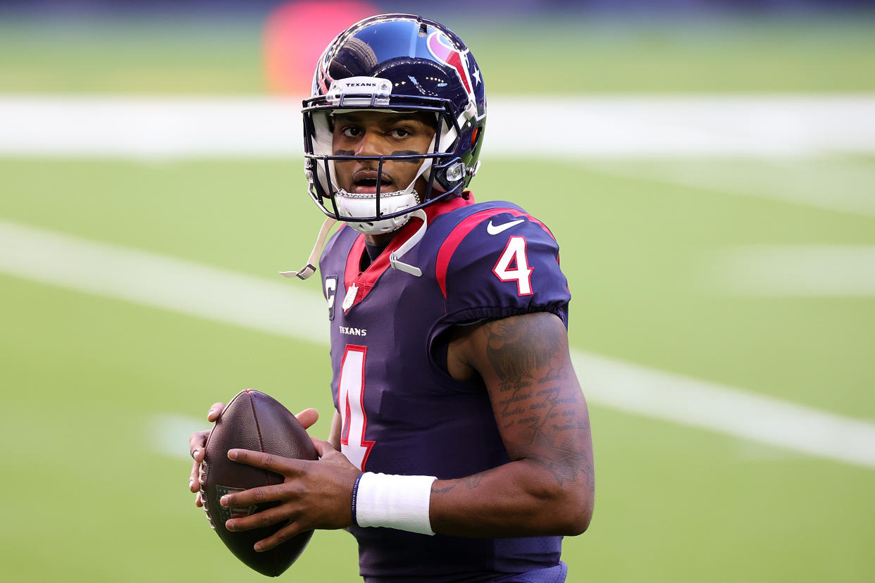 HOUSTON, TEXAS - JANUARY 03: Deshaun Watson #4 of the Houston Texans participates in warmups prior to a game against the Tennessee Titans at NRG Stadium on January 03, 2021 in Houston, Texas. (Photo by Carmen Mandato/Getty Images)