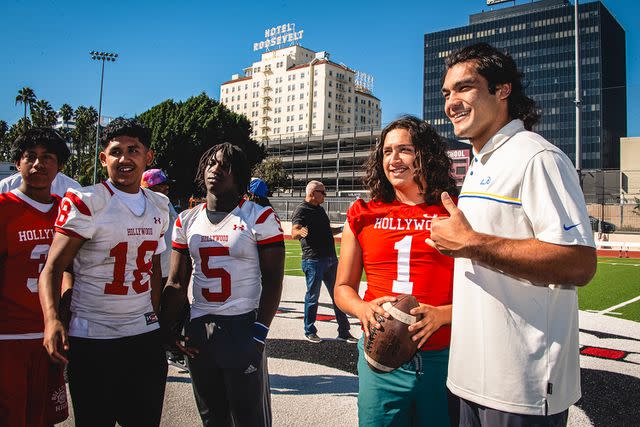 <p>Courtesy LA Rams</p> Rams Rookie Puka Nacua Visits Local High School Football Team Whose Coach is Fighting Cancer