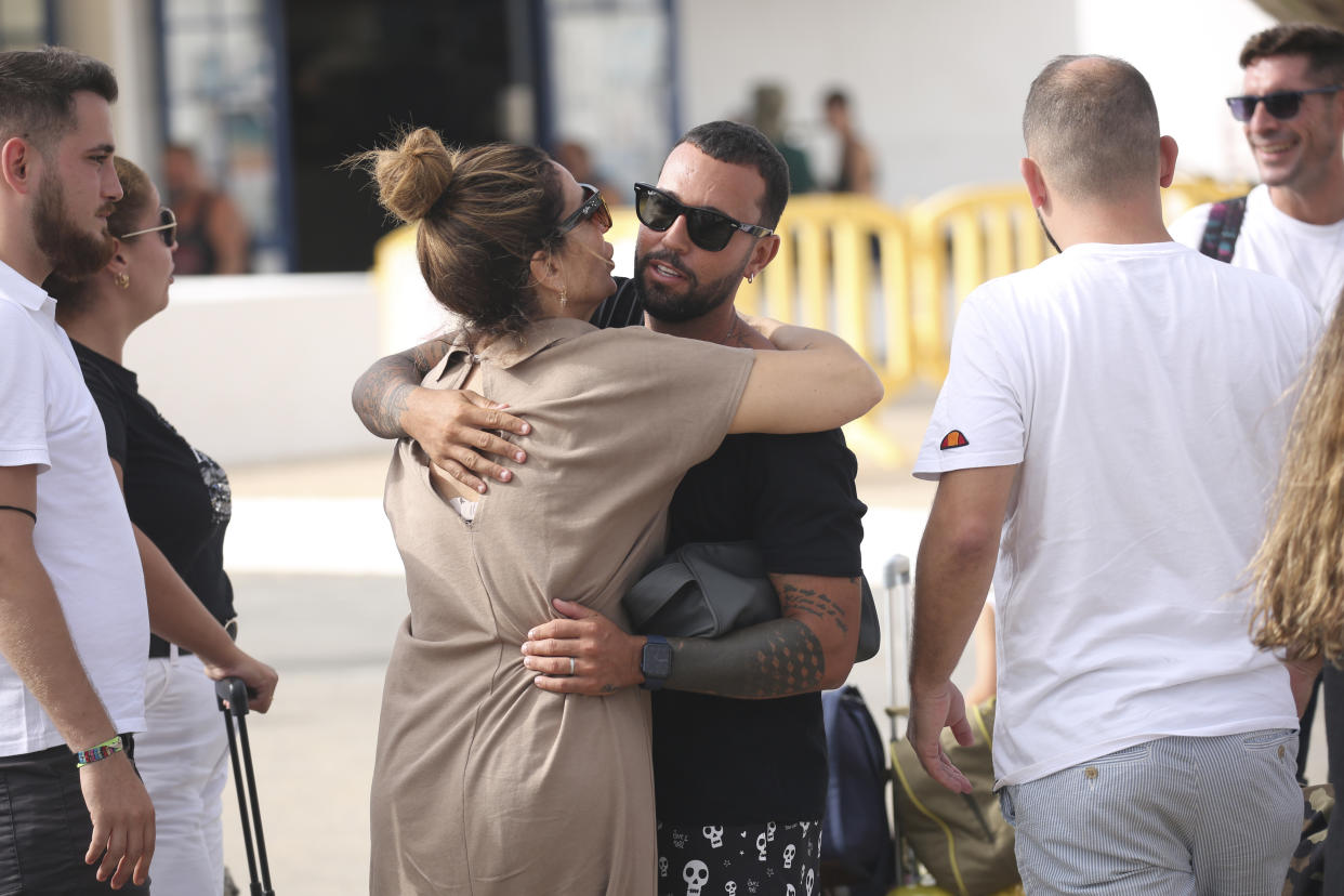 LA GRACIOSA, SPAIN - OCTOBER 02: Raquel Bollo says goodbye to Omar Sánchez before boarding the ferry to Lanzarote on October 2, 2021 in La Graciosa, Spain. (Photo By Jose Ruiz/Europa Press via Getty Images)