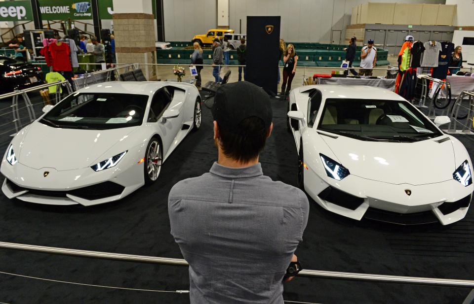 Two Lamborghinis on display at at the Denver Auto Show in Denver, Colorado.
