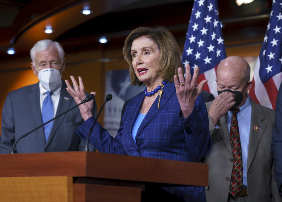 Speaker of the House Nancy Pelosi, D-Calif., flanked by Majority Leader Steny Hoyer, D-Md., left, and and Transportation and Infrastructure Committee Chair Peter DeFazio, D-Ore., discusses her legislative agenda, including voting rights, public health, and infrastructure, during a news conference at the Capitol in Washington, Friday, July 30, 2021. Hours before a nationwide eviction moratorium is set to expire, Pelosi is urging an extension in a longshot effort to prevent millions of Americans of being forced from their homes during a COVID-19 surge. (AP Photo/J. Scott Applewhite)