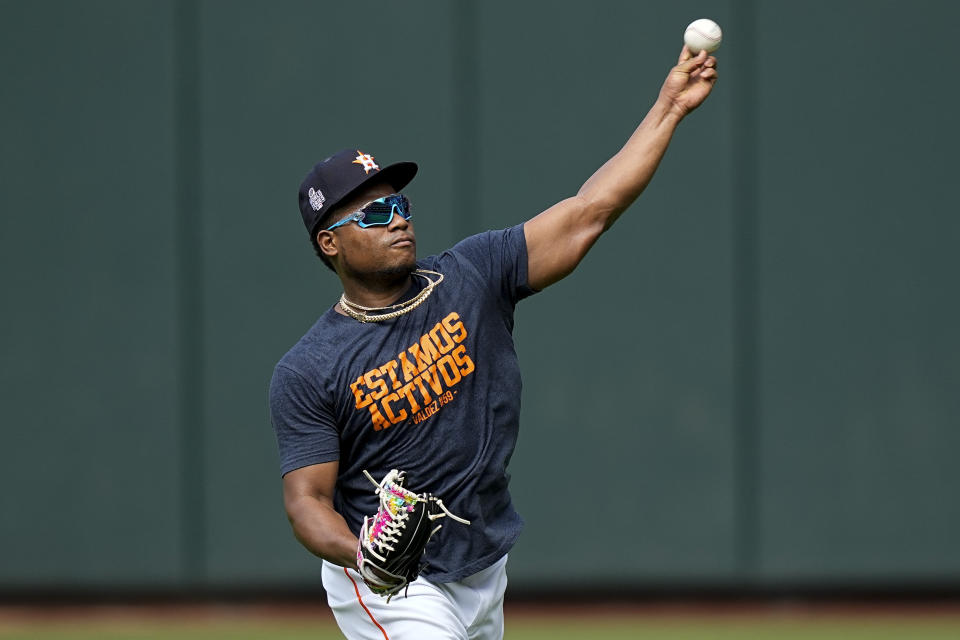 Houston Astros starting pitcher Framber Valdez warms up during batting practice before Monday, Oct. 25, 2021, in Houston, in preparation for Game 1 of baseball's World Series tomorrow between the Houston Astros and the Boston Red Sox. (AP Photo/David J. Phillip)