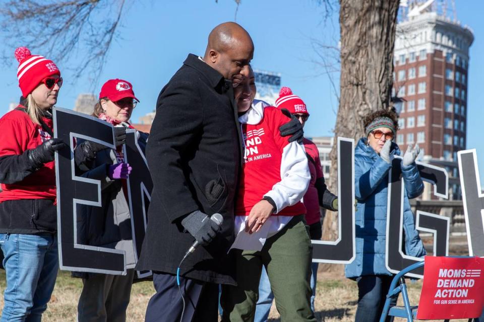 Kansas City Mayor Quinton Lucas (left) and Moms Demand Action Missouri leader Bety Godfroy embrace during the Kansas City Rally to End Gun Violence on Saturday at Washington Square Park.