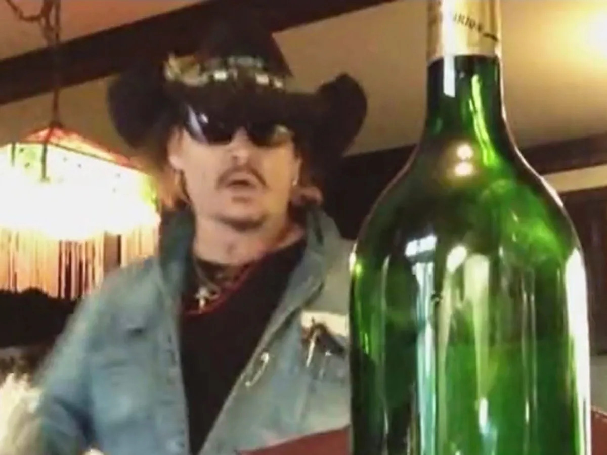 A video taken by Amber Heard shows Johnny Depp smashing cabinets in his home and..