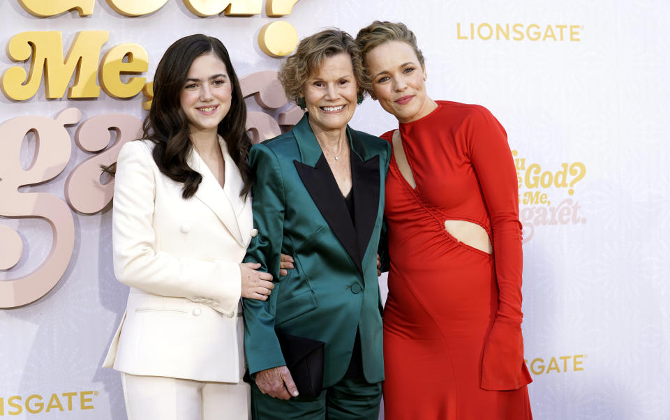 Abby Ryder Fortson, left, and Rachel McAdams, right, cast members in "Are You There God? It's Me Margaret," pose with Judy Blume, author of the 1970 novel upon which the film is based, at the premiere of the film, Saturday, April 15, 2023, at the Westwood Regency Village Theatre in Los Angeles. (AP Photo/Chris Pizzello)