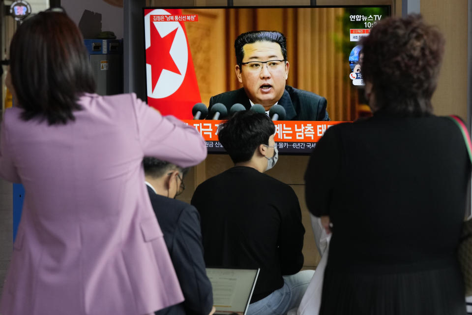 People watch a TV screen showing North Korean leader Kim Jong Un in a news program, at Seoul Railway Station in Seoul, South Korea, Thursday, Sept. 30, 2021. Kim expressed his willingness to restore stalled communication lines with South Korea to promote peace in early October, while he shrugged off recent U.S. offers for dialogue by calling them "more cunning ways" to conceal its hostility against the North, state media reported Thursday. (AP Photo/Ahn Young-joon)