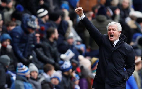 Mark Hughes celebrates a goal  - Credit: Reuters