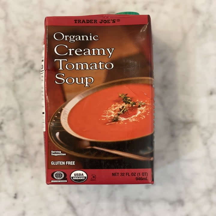 A carton of Trader Joe's creamy tomato soup